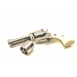 Ruger New Model Blackhawk Single Action  Revolver in .45 LC caliber with a 4 ¾”  barrel, white outli