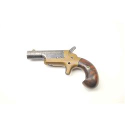 Colt 3rd Model Derringer in .41 rimfire showing considerable original blue with early style curved
