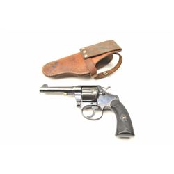Colt Police Positive Double Action revolver in .38 caliber with a 4” barrel and early hard rubber