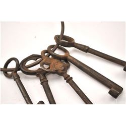 Antique 19th century set of hand cuffs with a screw style key. Additionally, the lot includes a l