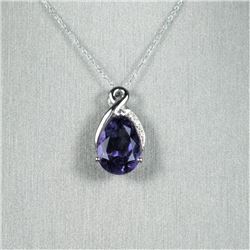 Elegant Pear Shape Amethyst and Diamond Pendant featuring a richly colored Amethyst weighing appro