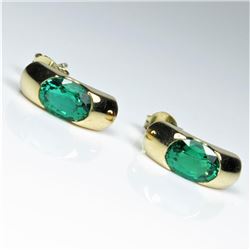 Sophisticated Chatham created Emerald Earrings featuring 2 oval cut matching Emeralds weighing app