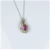 Image 2 : Colorful Natural Ruby and Diamond Pendant  featuring pear shaped Ruby accented with 15  round cut Di