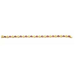 One beautifully crafted 18k yellow gold ruby /diamond bracelet containing approx 5ct of ruby and 1