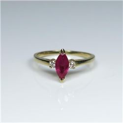 Pretty Burmese colored Ruby and Diamond Ring featuring a marquise cut Ruby weighing approx. 0.80