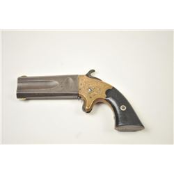 American Standard Wheeler’s Paten O/U Derringer in .22/.32 caliber with original New York Scroll e