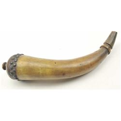 A large American tack decorated powder horn. 19th century. Measures 13 ½” overall. Finely turned w
