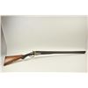 Image 1 : Double barrel Exposed Hammer Shotgun in 10 GA  with locks marked “John Buckingham B.P.  Birmingham” 