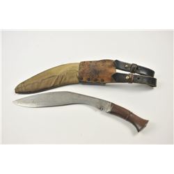 A genuine British Army of India WWII military Kukri or Ghurka knife in original scabbard. The curv