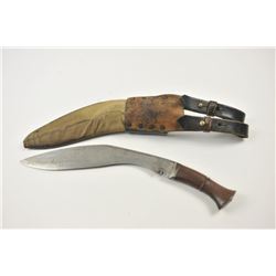 A genuine British Army of India WWII military  Kukri or Ghurka knife in original scabbard.  The curv