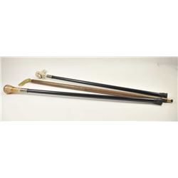 Lot of five gentlemen’s walking sticks with decorative handles. The walking sticks are all approx