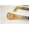 Image 2 : Lot of five gentlemen’s walking sticks with  decorative handles.  The walking sticks are  all approx