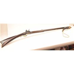 Hatfield marked .45 caliber flintlock Kentucky style black powder rifle with a 39” barrel, 56” in