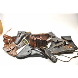 Lot of vintage holsters from an old time collector, including Luger, P-38, three U.S., .45 Auto, s