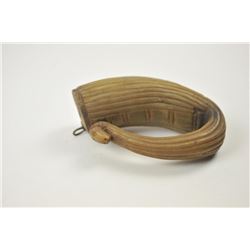 An unusual 19th century or earlier powder horn fluted and recurved. Carved with a cobra (?). Possi