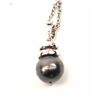 Image 3 : One beautiful Tahitian black pearl pendant   made in 18k white gold set with diamonds., on  a 20”  w