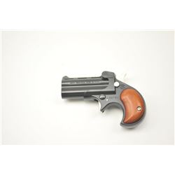Davis Model OM-22 O/U derringer, .22 Mag, Serial #185783. The pistol is in nearly excellent overa