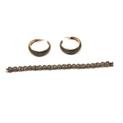 One marquisette bracelet and earrings set made in sterling silver Est:$250-500