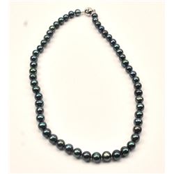 One beautiful strand of black pearls 20 inches long and are 9 mm in diameter Est:$250-500