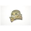 Image 1 : Lot of two WWII German pieces.  A German  “Death Head” Hussar’s hat plate and canvas  pendent marked