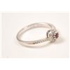 Image 3 : One petite ruby diamond halo ring made in 18  k white gold Est:$150-300