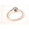 Image 4 : One petite ruby diamond halo ring made in 18  k white gold Est:$150-300