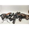 Image 1 : Leather lot of 2 basket weave gun belts, 6  leather flap duty holsters and 2 leather  magazine pouch