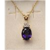 Image 1 : One fine oval Mozambique amethyst set in 14k  yellow gold pendant  with diamonds  Est:$150-300