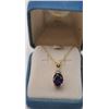 Image 2 : One fine oval Mozambique amethyst set in 14k  yellow gold pendant  with diamonds  Est:$150-300