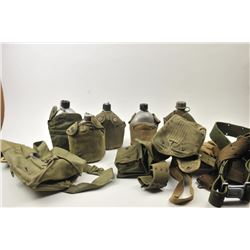 Bonanza lot of military items including canteens, mess kits and other assorted military gear. Est