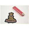 Image 1 : Lot of two insignias from an estate in a  paper envelope.  The lot includes British art  patch with 
