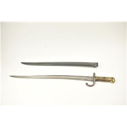 “St. Etienne Arsenal” marked and 1873 dated French sword bayonet and scabbard. Numbered L-3664 on