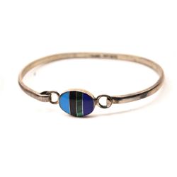 2 hinged silver bracelets, one inlaid with lapis,turquoise, and malachite Est:$50-100