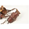 Image 2 : Lot of three vintage leather gun belts and  single action holsters.  The holsters are by  various ma