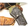 Image 1 : Lot of three tooled leather cartridge belts  with single action holsters.  The holsters  are in fair