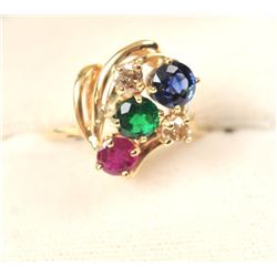 One beautifully designed multi gem ring containing ruby, sapphire,emerald and 2 yellow diamonds se