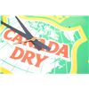 Image 2 : cracked canada dry clock , dustpans , etc