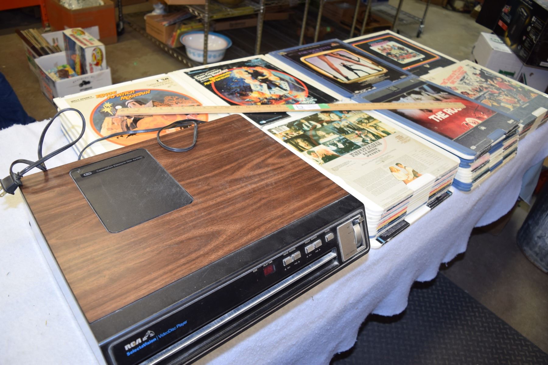 massive video disc lot with working rca player, 78 count movie lot