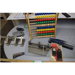 Radio, Abacus, and 3 Hole Punches