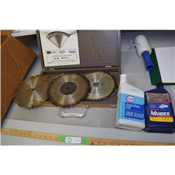 Saw Blades and Full Oil Containers