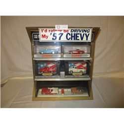 Table Top Display Case 16" W by 18" T with 7 1950s Assorted Trucks and Cards