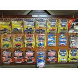 Framed Display Peg Board 26" by 44" with 21 N.I.P Miniature Chevrolet Trucks and Cars