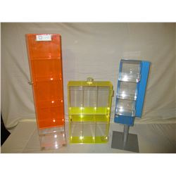 3 Assorted Plastic Showcases
