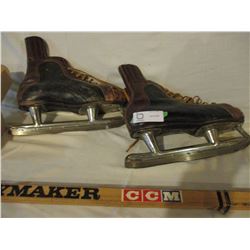 Old CCM Hockey Sticks, Skates and 7 Pucks