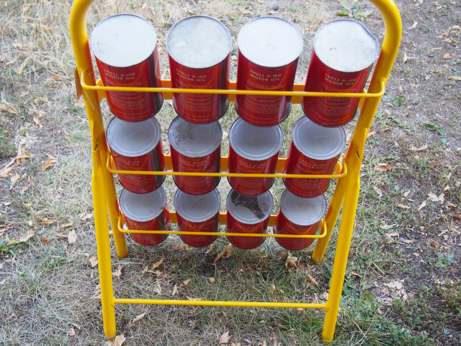Shell Motor Oil Display Rack with 12 Full Shell Oil Cans 47