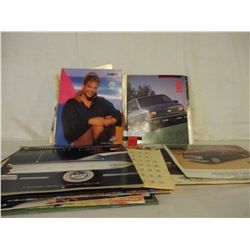 Large Box of 1980s/1990s Chevrolet Accessory Car Guides and Calendars