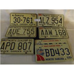 7 North Dakota Assorted License Plates