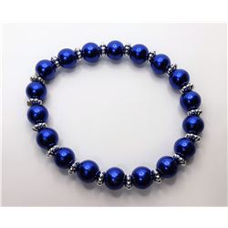 9)  SILVER TONE AND BLUE METALLIC PEARL