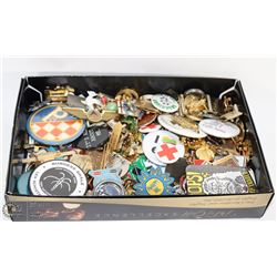 BOX OF ASSORTED PINBACK BUTTONS AND LAPEL PINS.