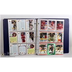 BINDER OF HOCKEY CARDS (249).